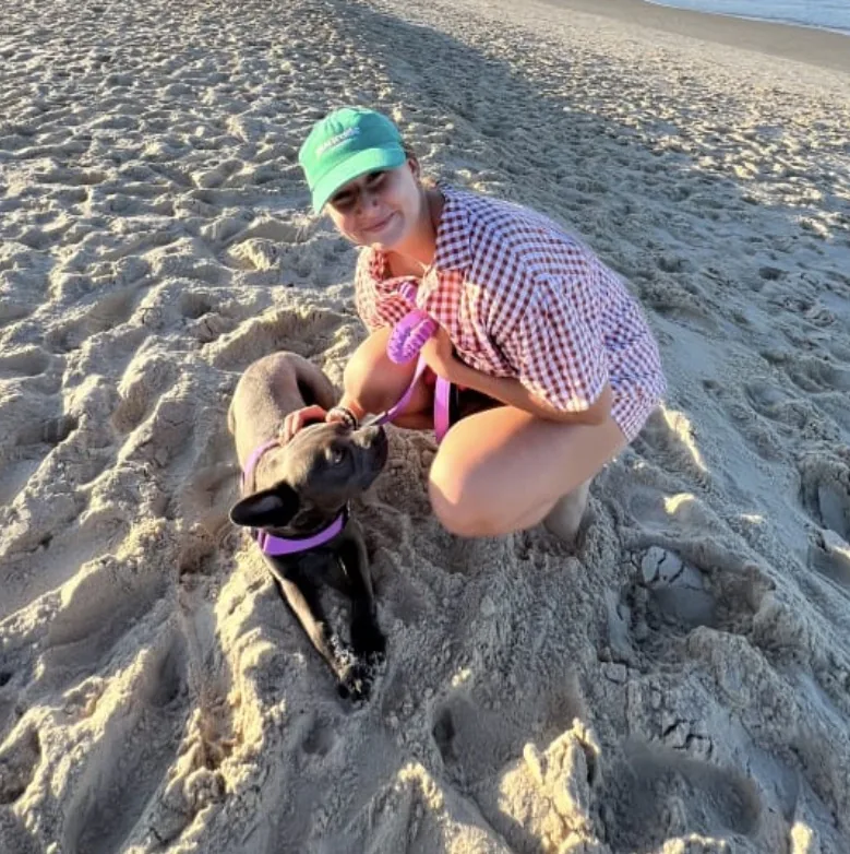 Sitter Makayla with a French bulldog